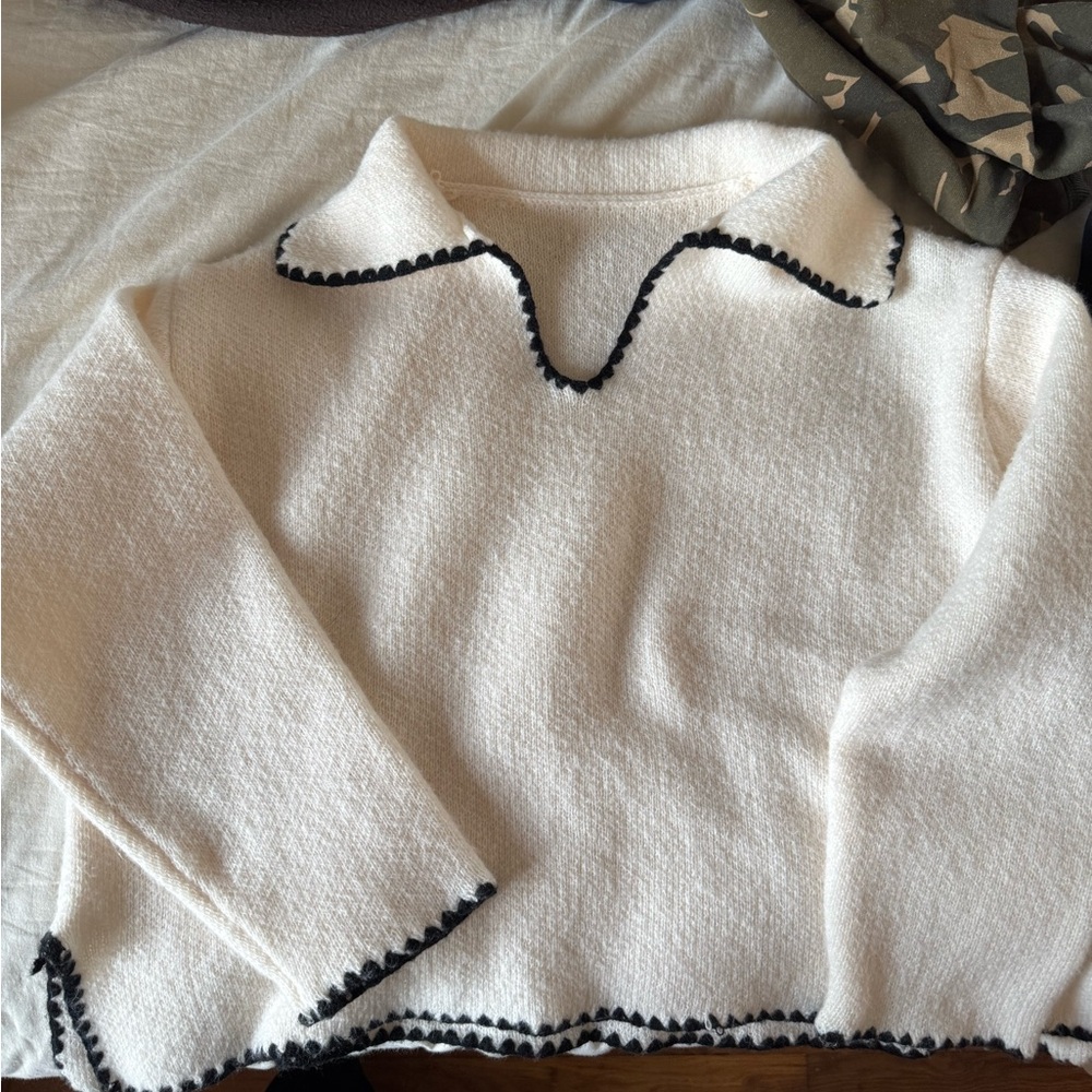 Cream Sweater with Black Trim